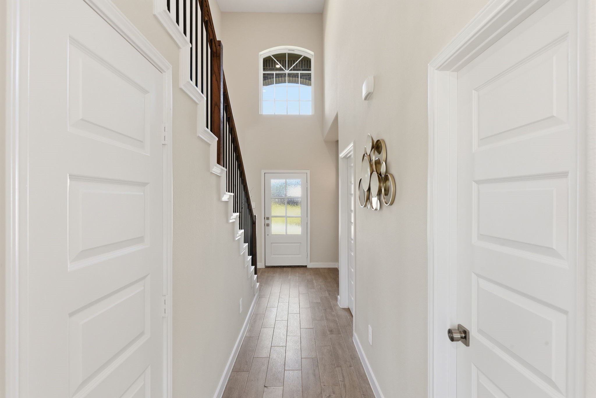 2443 Inlet Court Fresno, TX 77545 - Photo 9 of 50 a view of a hallway with front door