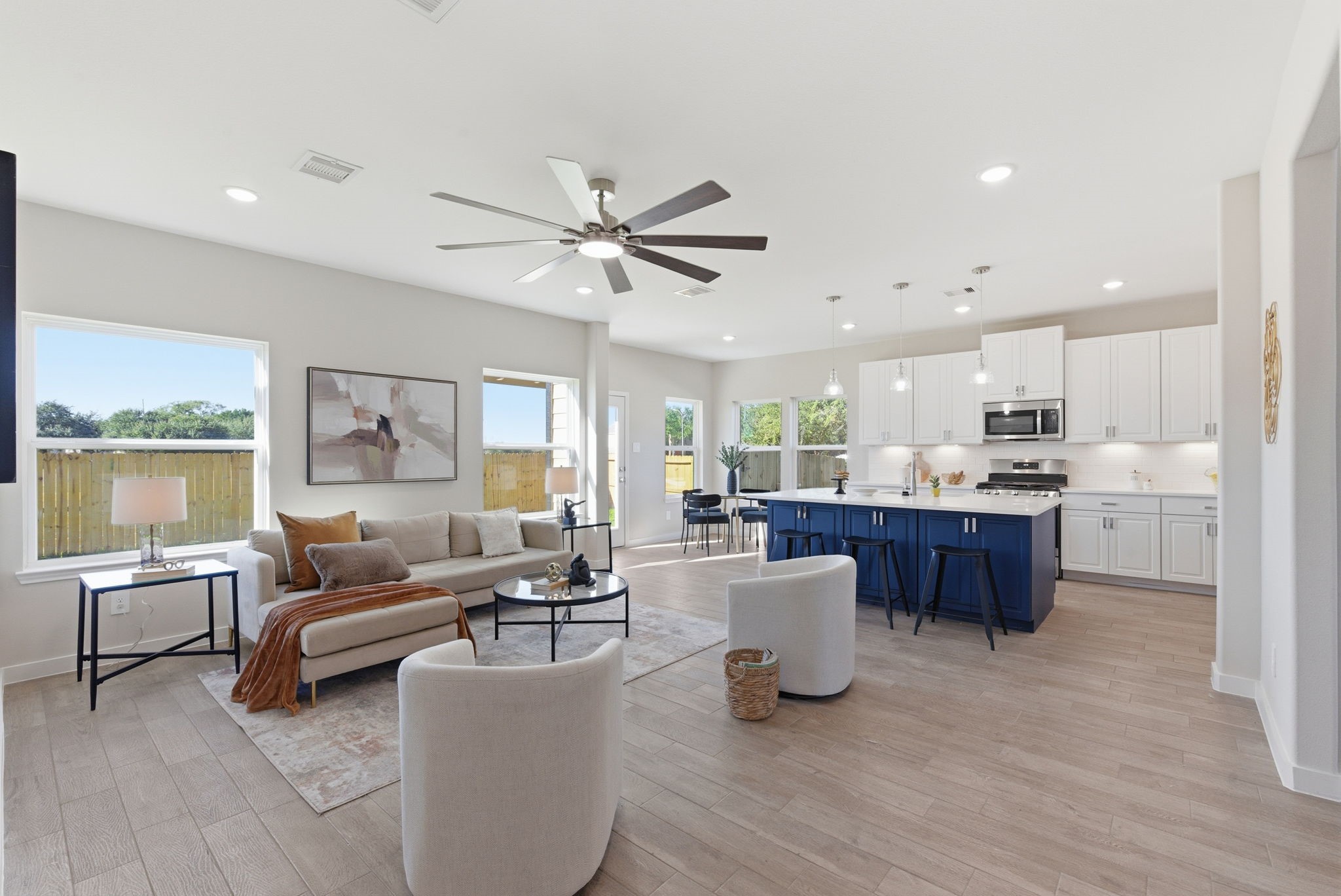 2443 Inlet Court Fresno, TX 77545 - Photo 10 of 50 a living room with furniture kitchen view and a large window