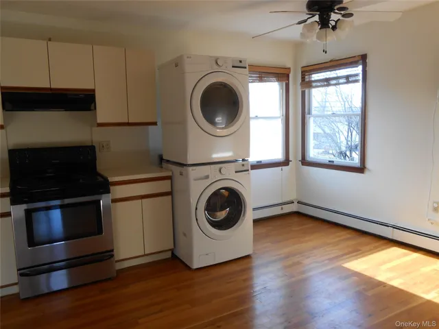 a kitchen with a stove and a microwave