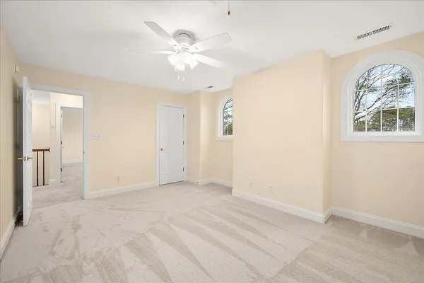 a view of a dining area with furniture and a chandelier