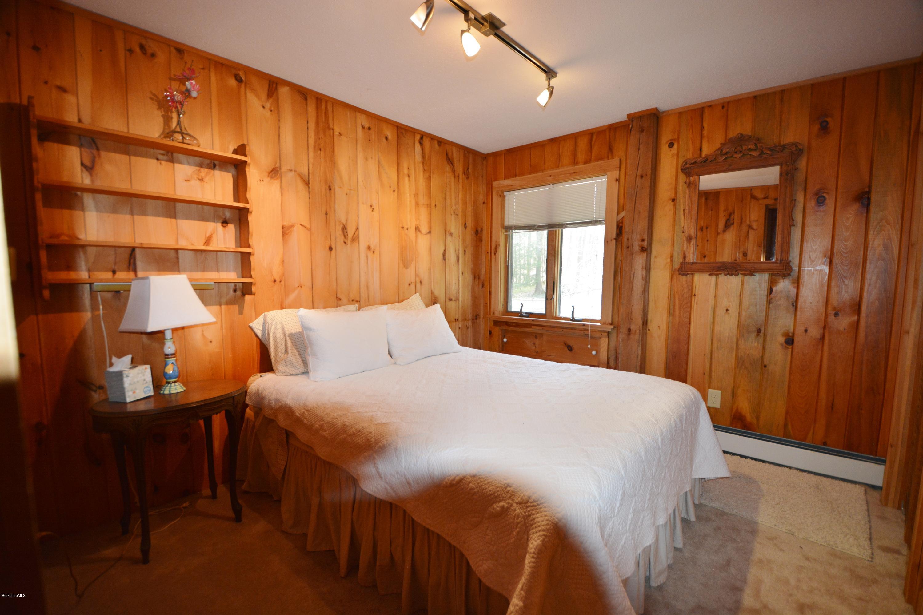 262 North Beech Plain Road Sandisfield, MA 01255 - Photo 12 of 23 a bedroom with a bed and a window