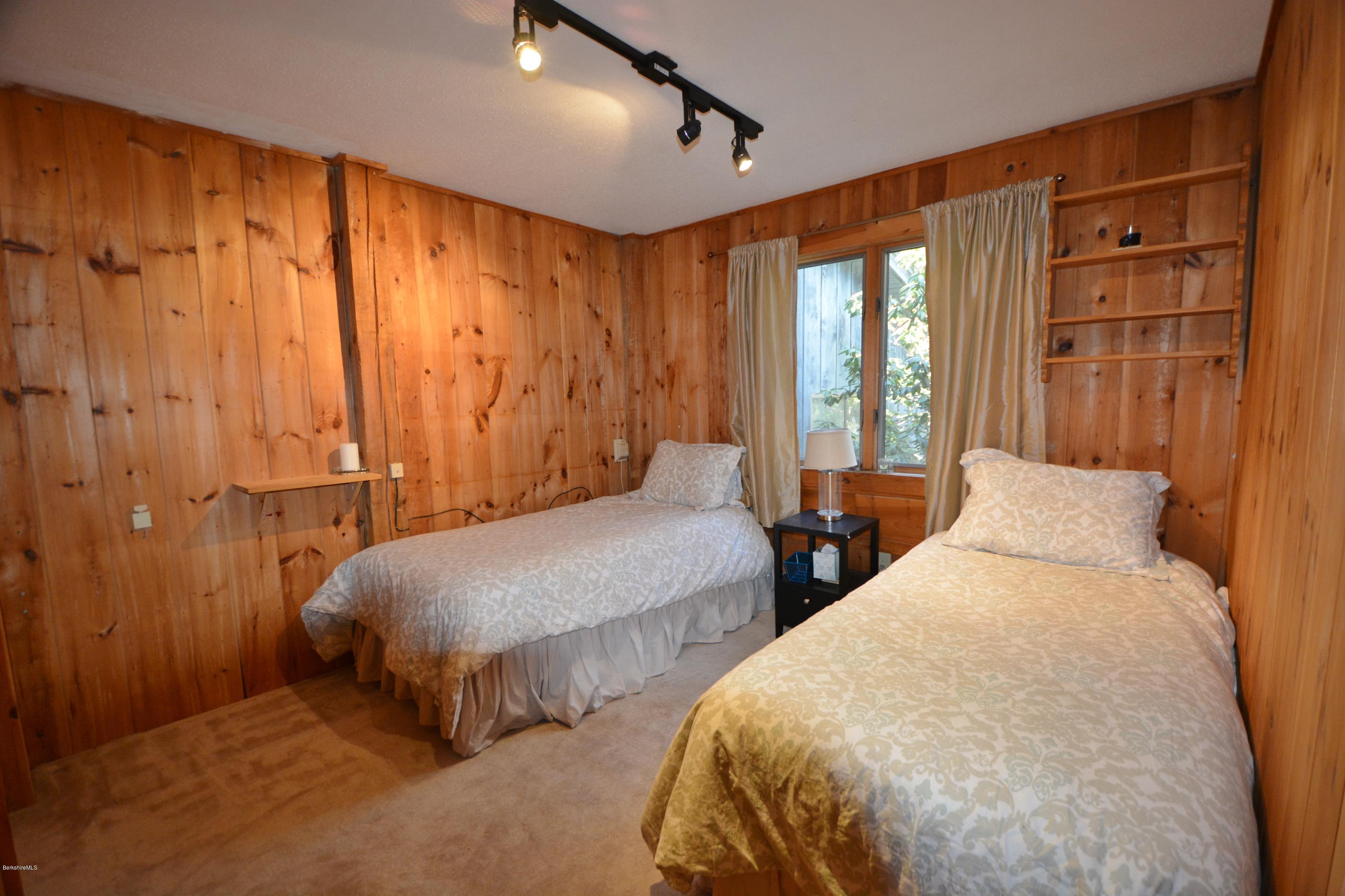 262 North Beech Plain Road Sandisfield, MA 01255 - Photo 13 of 23 a bedroom with two beds and a window