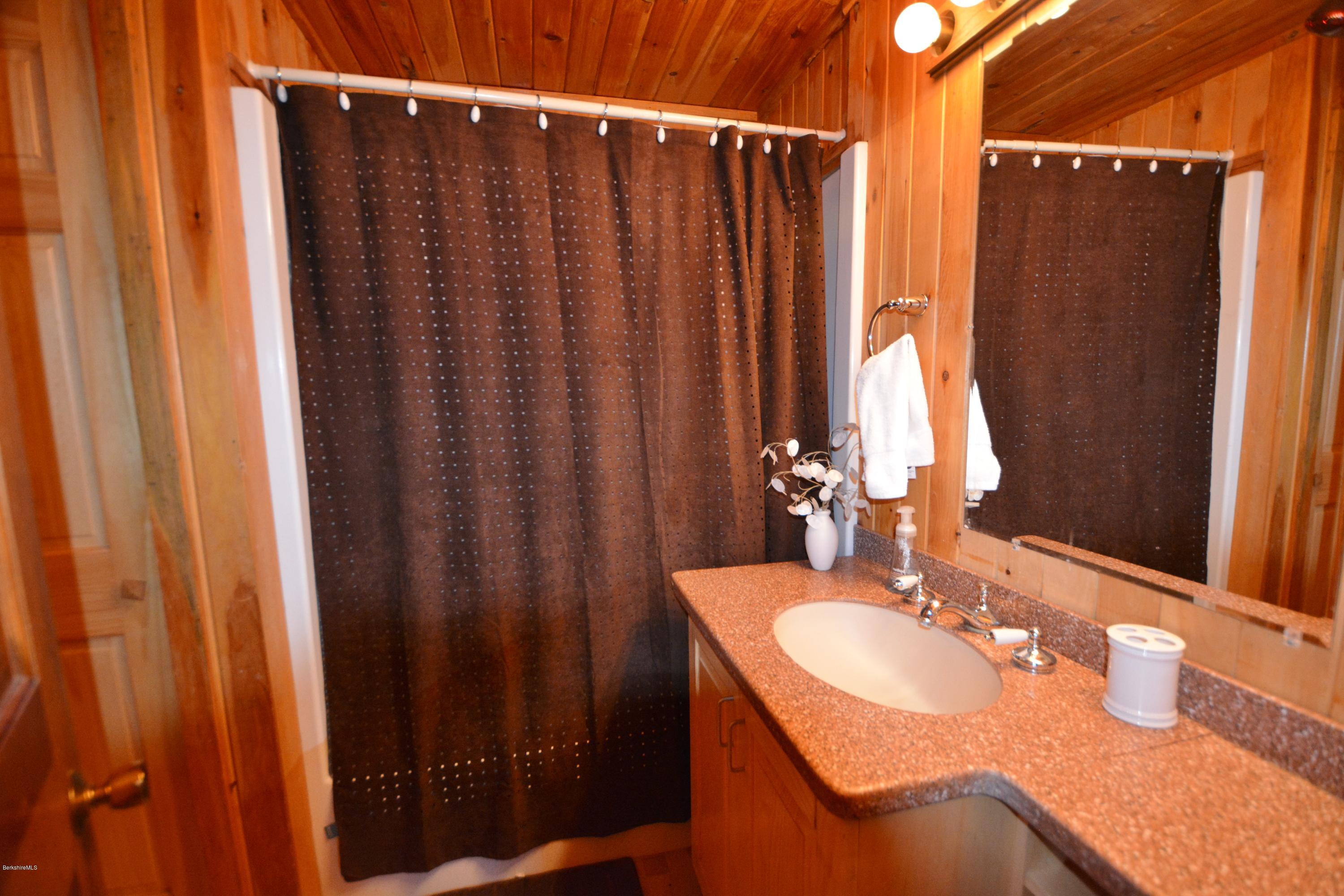 262 North Beech Plain Road Sandisfield, MA 01255 - Photo 14 of 23 a bathroom with shower sink and mirror