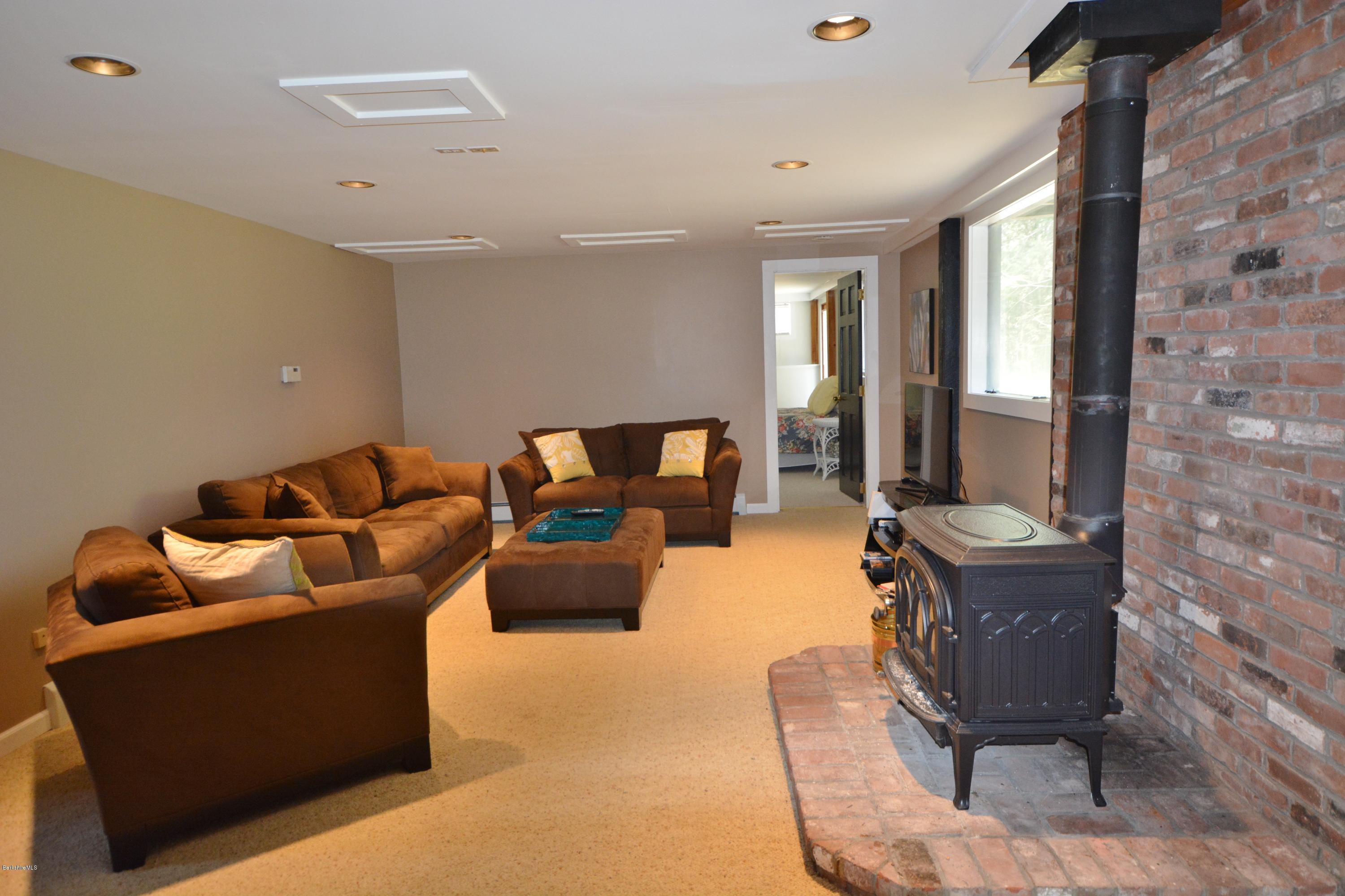 262 North Beech Plain Road Sandisfield, MA 01255 - Photo 16 of 23 a living room with furniture and a window