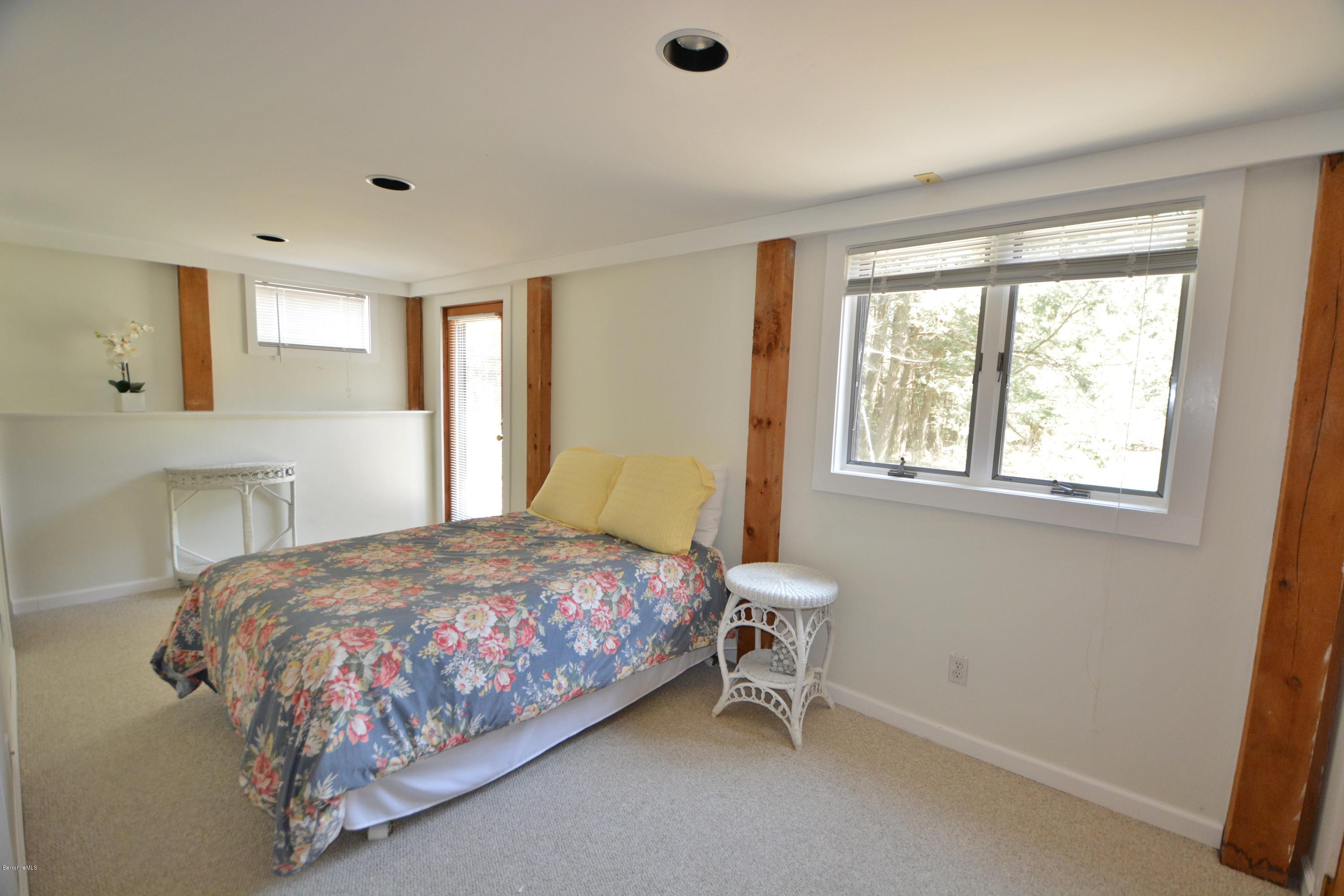 262 North Beech Plain Road Sandisfield, MA 01255 - Photo 19 of 23 a bedroom with a bed and a window