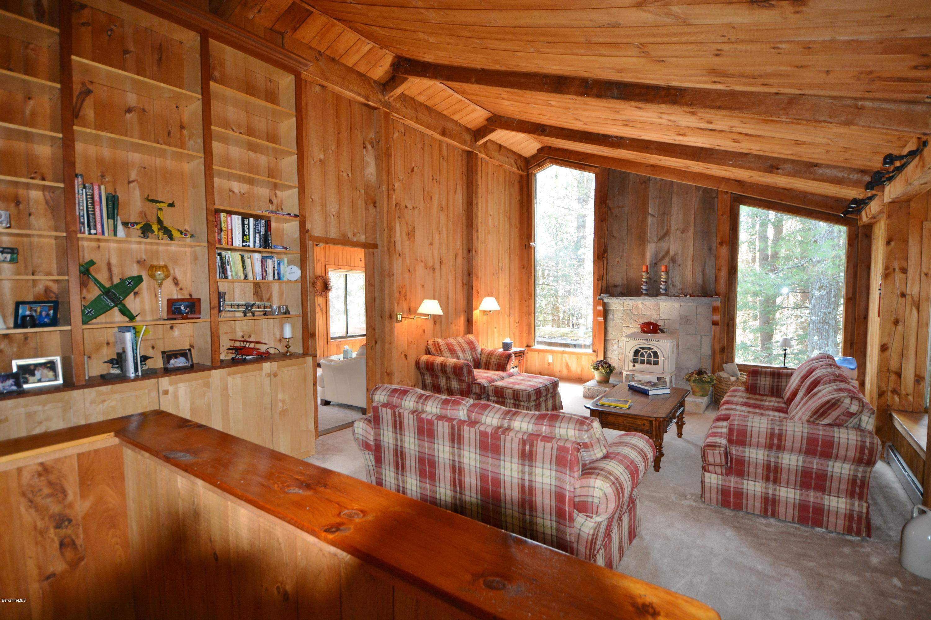 262 North Beech Plain Road Sandisfield, MA 01255 - Photo 3 of 23 a living room with furniture and large windows