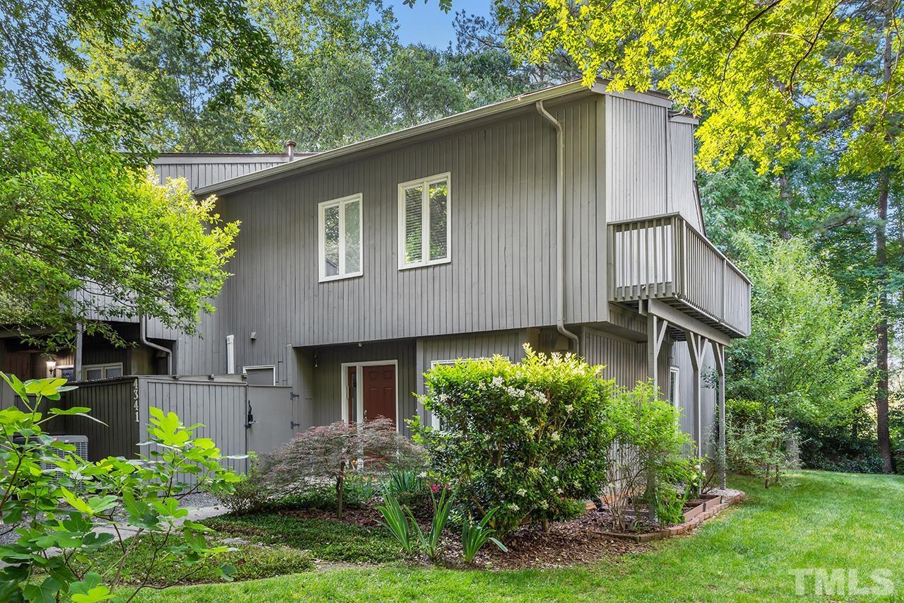 4341 Sunscape Lane Raleigh, NC 27613 - Photo 1 of 32 a front view of a house with garden