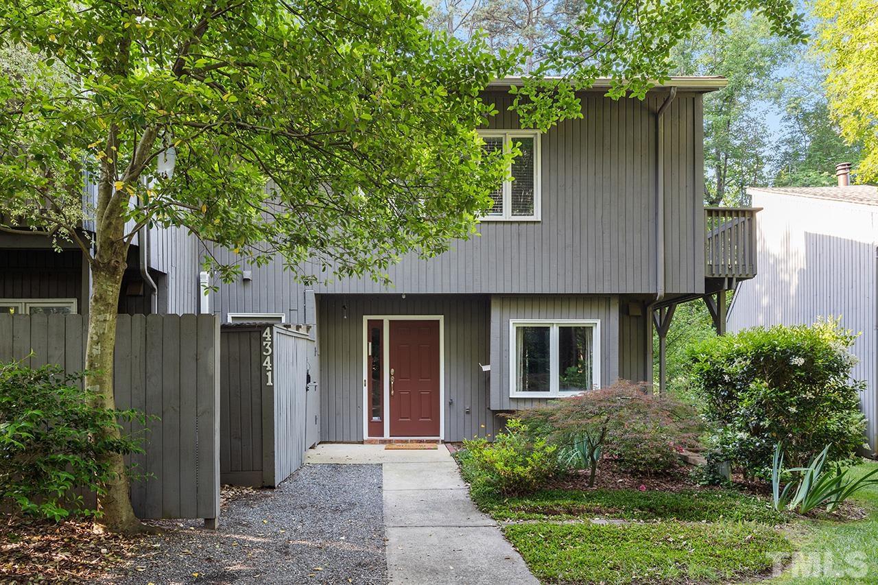 4341 Sunscape Lane Raleigh, NC 27613 - Photo 2 of 32 a front view of a house with garden