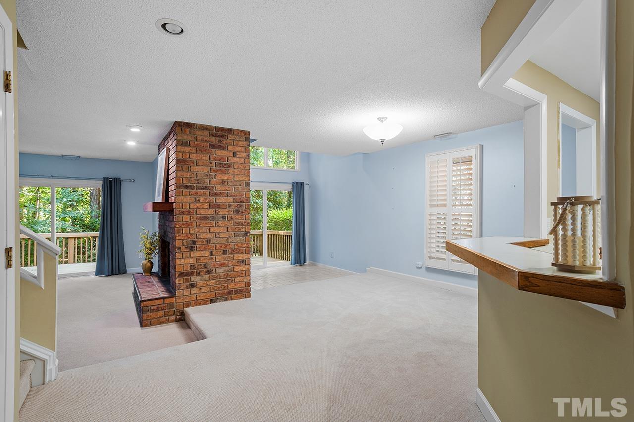 4341 Sunscape Lane Raleigh, NC 27613 - Photo 4 of 32 a view of an empty room with a window