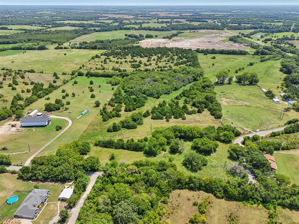 1456 Willy Vester Road Van Alstyne, TX 75495 - Photo 12 of 13 an aerial view of a houses with a yard