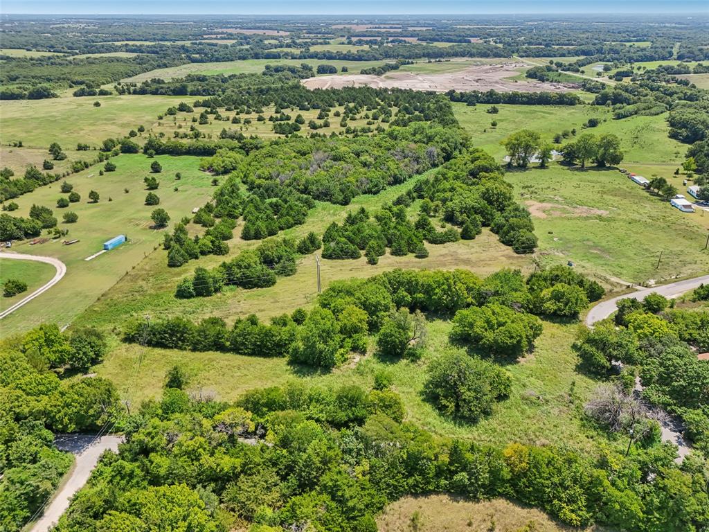 1456 Willy Vester Road Van Alstyne, TX 75495 - Photo 13 of 13 an aerial view of a houses with outdoor space