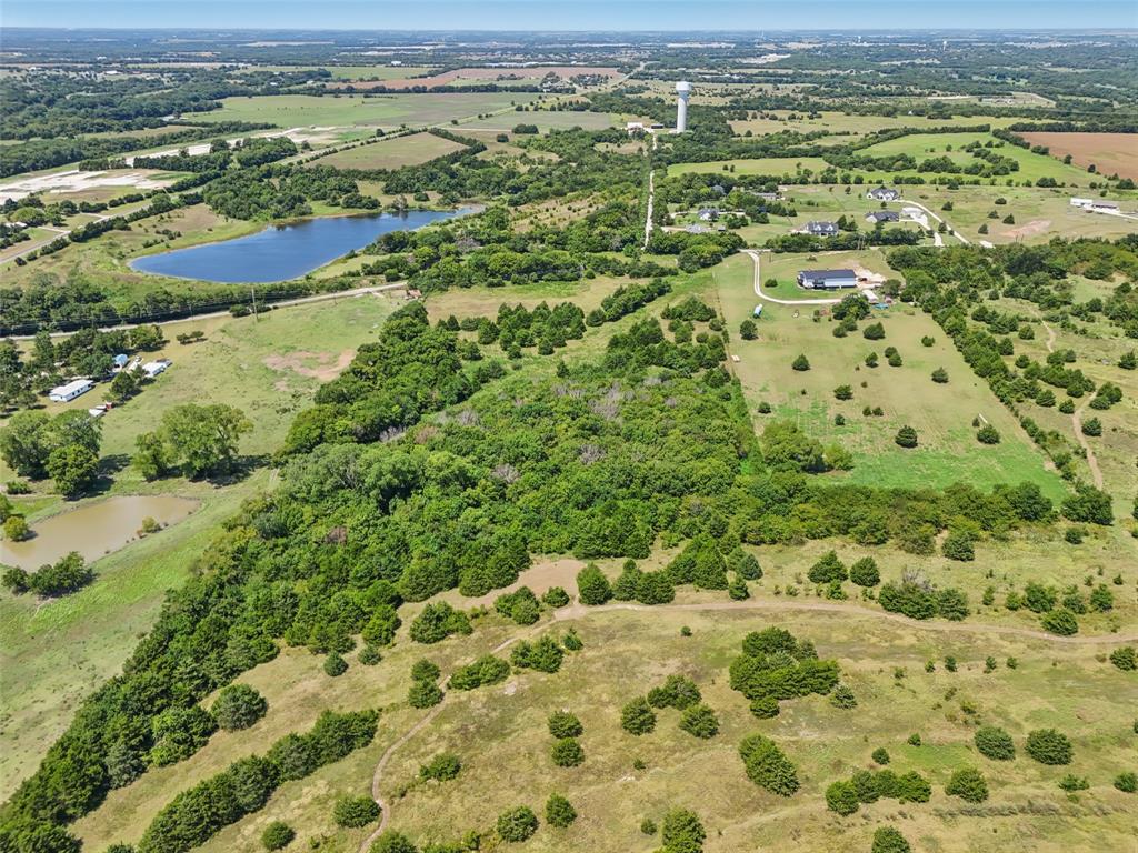 1456 Willy Vester Road Van Alstyne, TX 75495 - Photo 7 of 13 a view of a city with an ocean beach