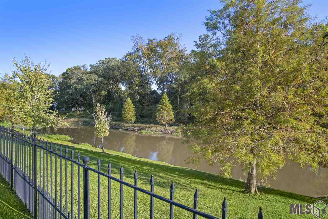 7723 Ibiza Drive Baton Rouge, LA 70820 - Photo 2 of 22 Waterfront View of Bayou Fountain
