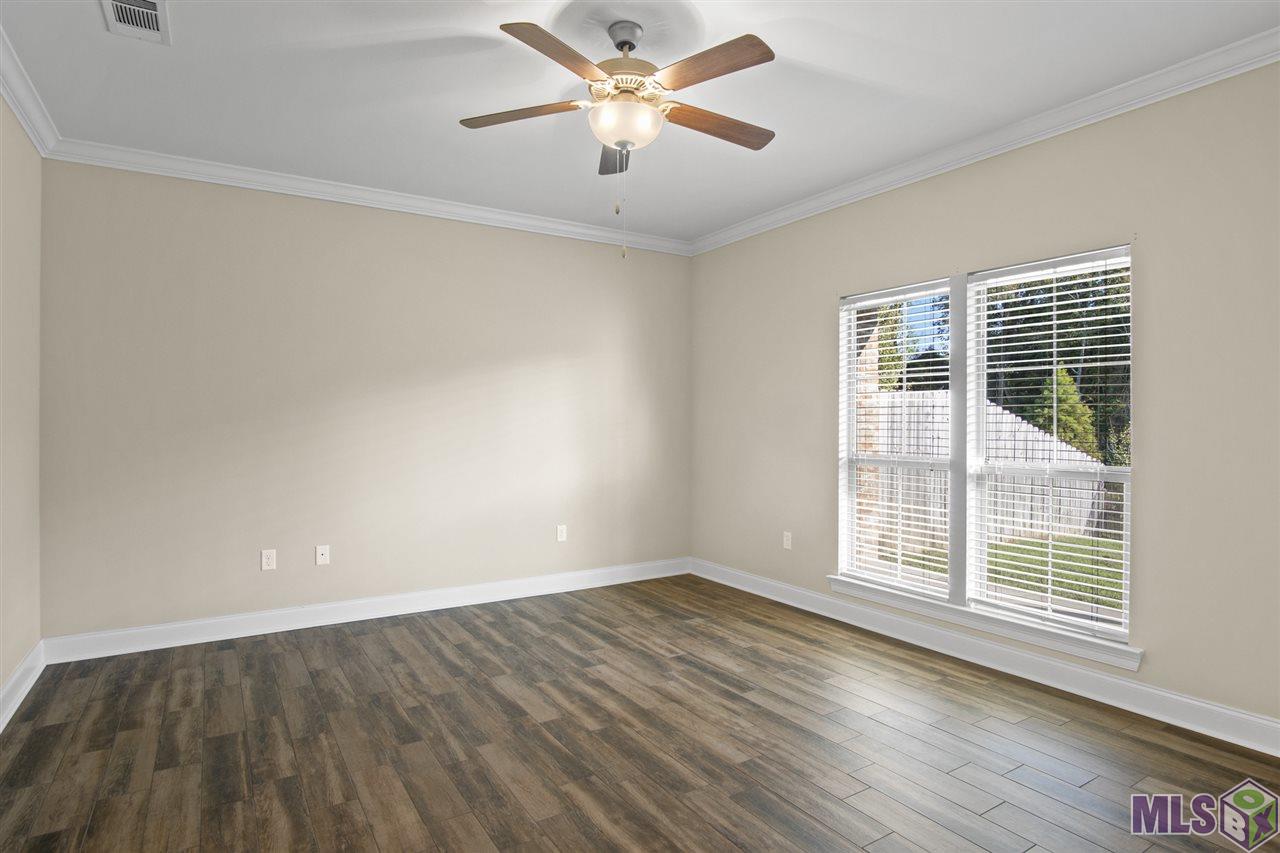 7723 Ibiza Drive Baton Rouge, LA 70820 - Photo 8 of 22 Master bedroom with waterfront view