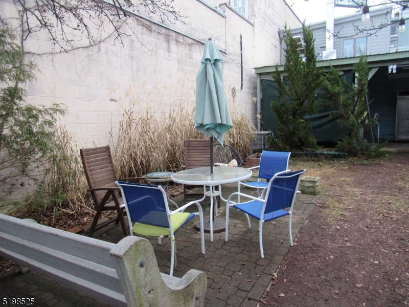 49 Bridge Street Frenchtown, NJ 08825 - Photo 12 of 12 a view of a table and chairs in the patio