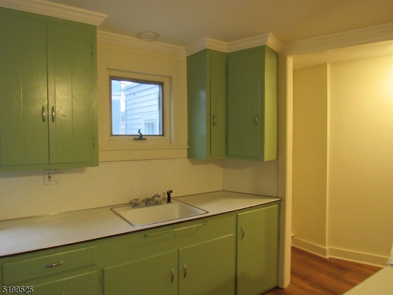 49 Bridge Street Frenchtown, NJ 08825 - Photo 3 of 12 a bathroom with a sink and a mirror