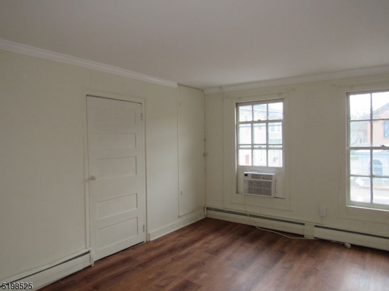 49 Bridge Street Frenchtown, NJ 08825 - Photo 10 of 12 an empty room with wooden floor and windows