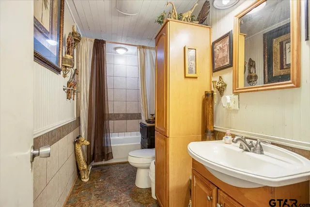 a bedroom with bed and window