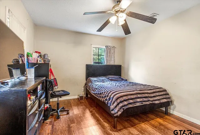 a kitchen with cabinets stainless steel appliances and a counter top space