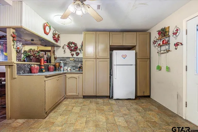 a house view with a garden space