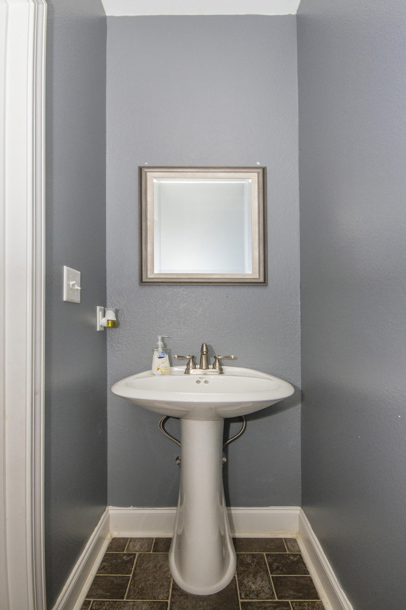 7480 Dry Valley Road Loudon, TN 37774 - Photo 15 of 27 a bathroom with a sink and a mirror