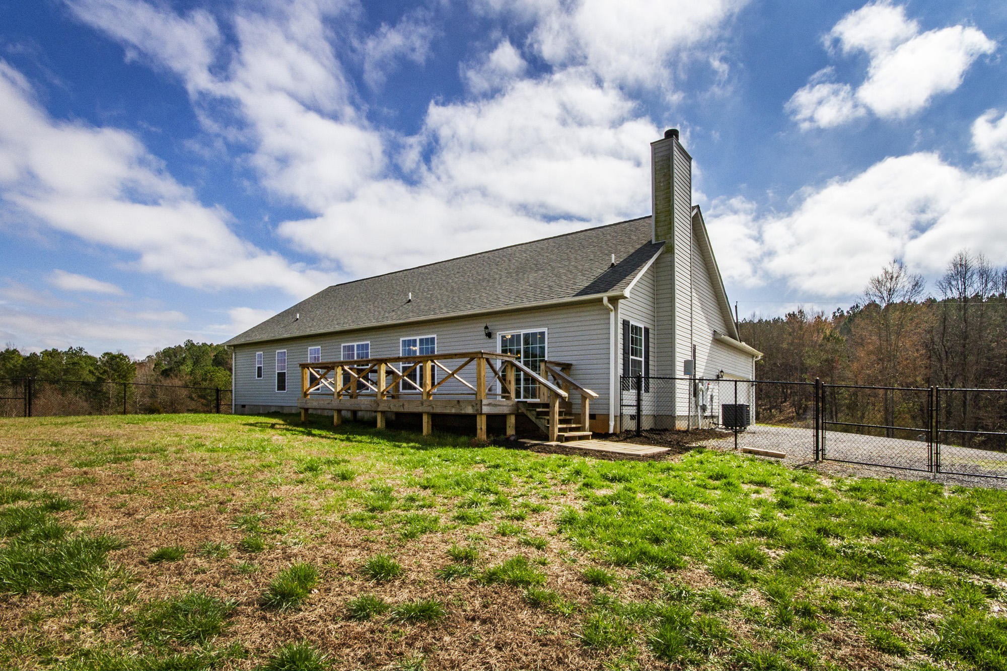 7480 Dry Valley Road Loudon, TN 37774 - Photo 25 of 27 a view of a house with backyard and garden