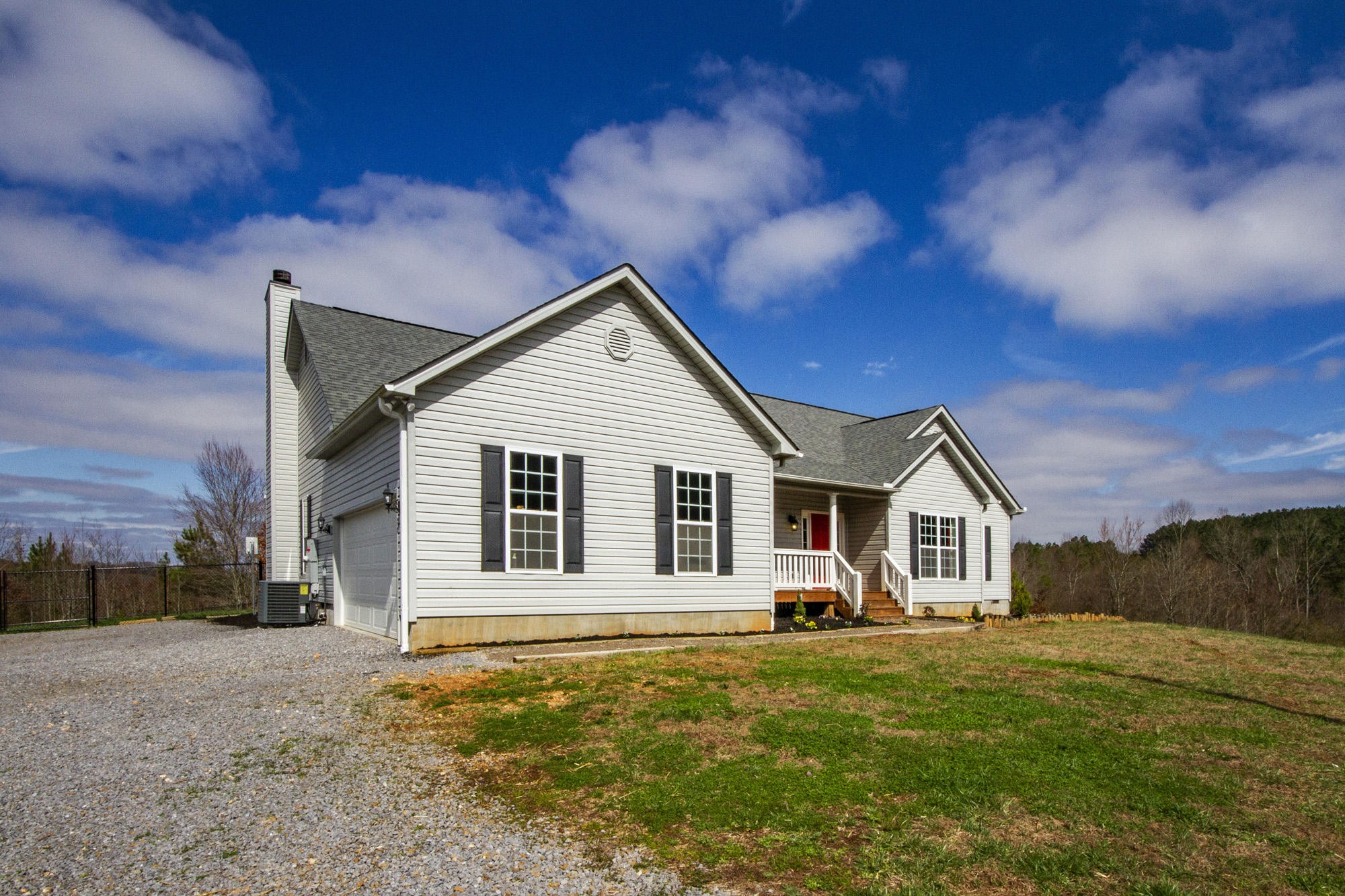 7480 Dry Valley Road Loudon, TN 37774 - Photo 27 of 27 a front view of a house with a garden