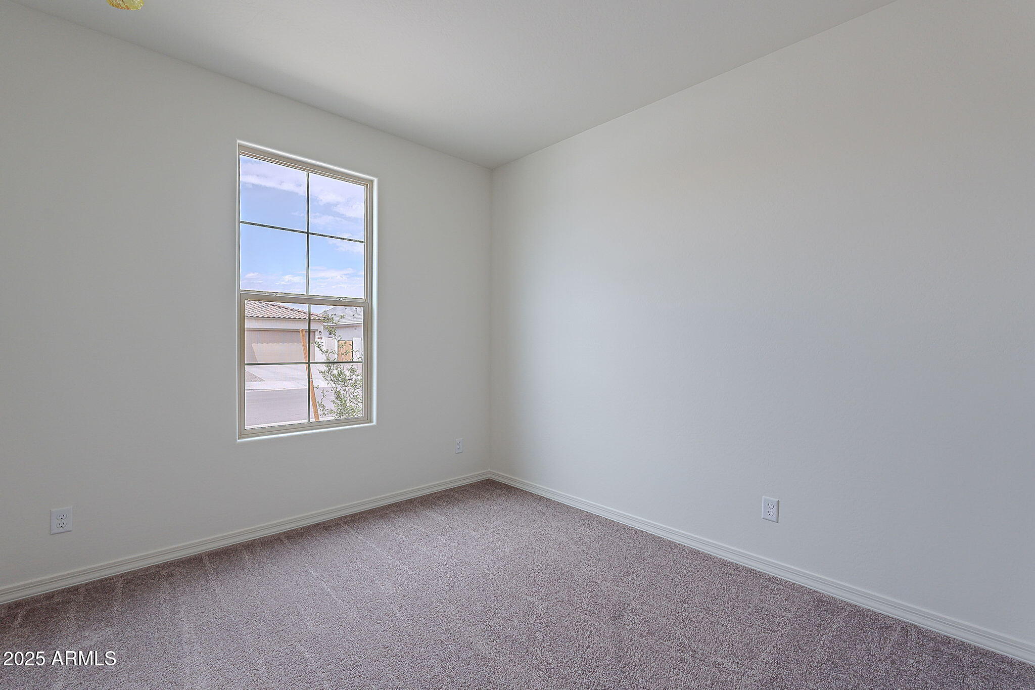 40025 Bunker Drive Maricopa, AZ 85138 - Photo 16 of 18 an empty room with windows