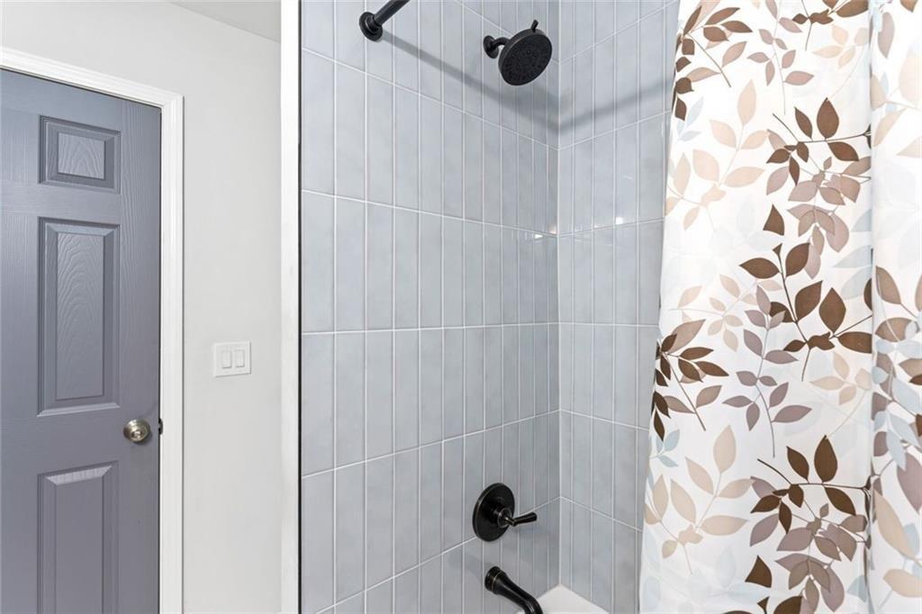 1326 Stella Circle Southwest Mableton, GA 30126 - Photo 15 of 26 a bathroom with a shower