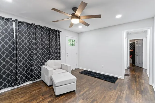 wooden floor in a room with a window