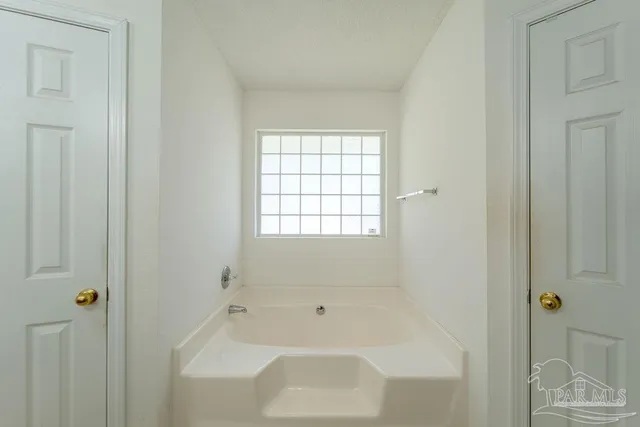 a bathroom with a bathtub
