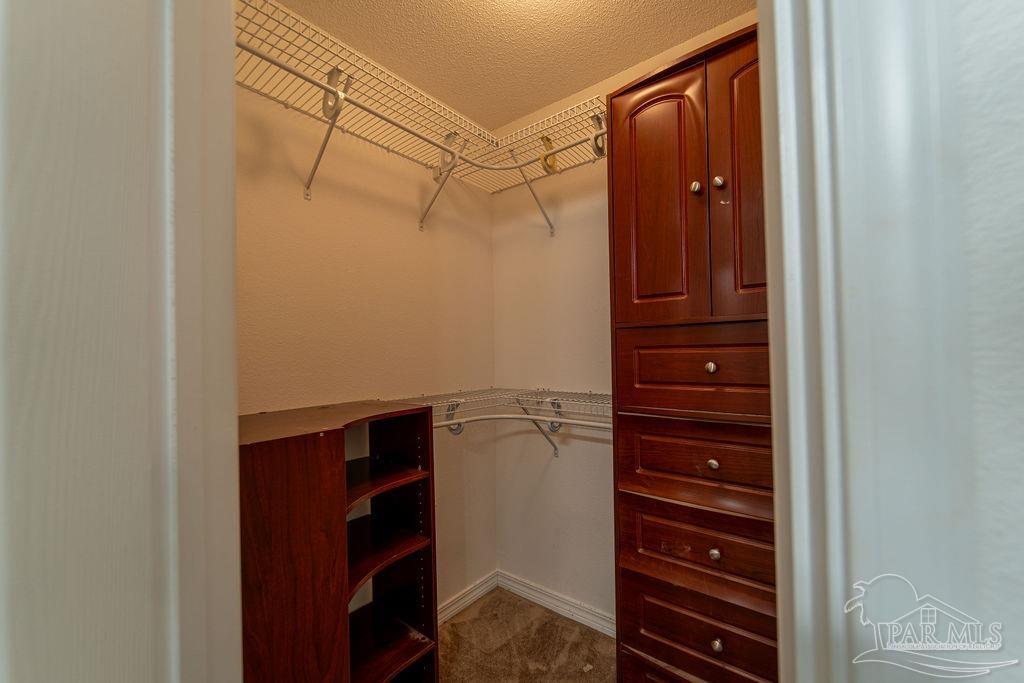 4907 Chads Circle Pace, FL 32571 - Photo 33 of 40 a view of walk in closet