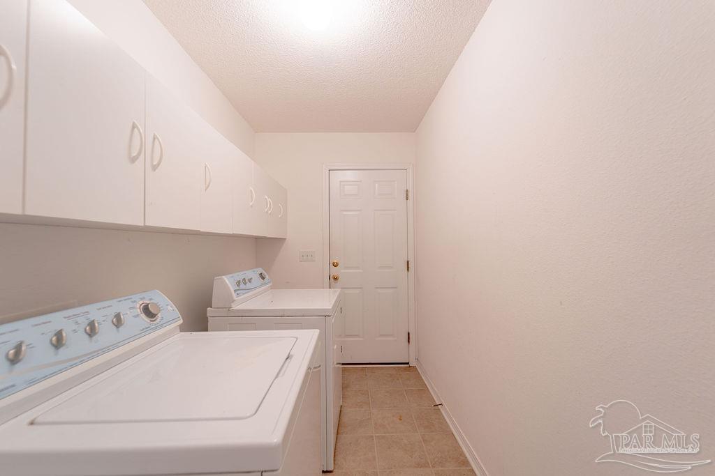 4907 Chads Circle Pace, FL 32571 - Photo 34 of 40 a room with storage and utility