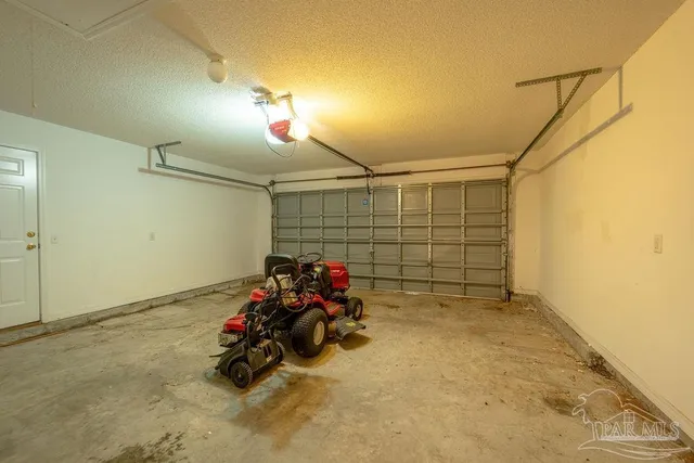 a view of a garage with storage