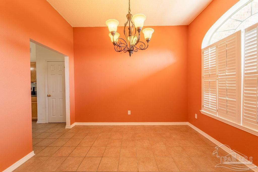 4907 Chads Circle Pace, FL 32571 - Photo 6 of 40 a view of a livingroom with a window