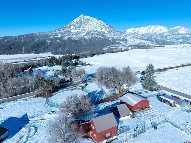 a view of a fireplace with sitting area