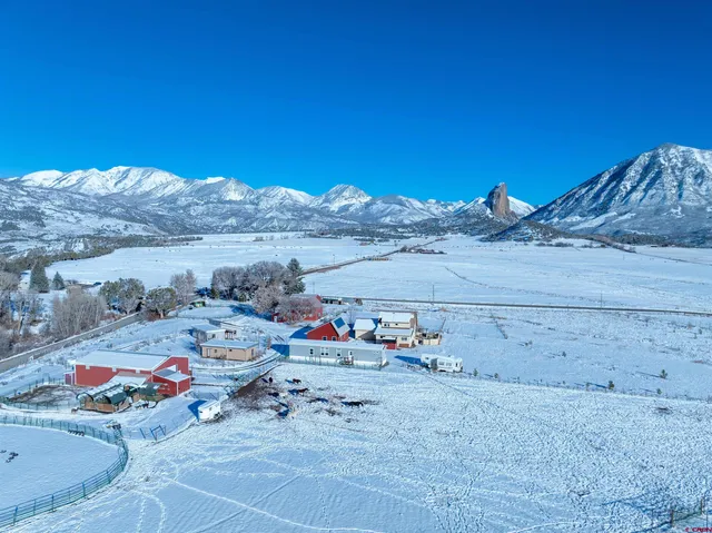 a view of a chairs and table in the terrace