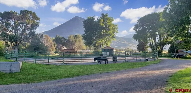 a view of a sky with mountains in the background
