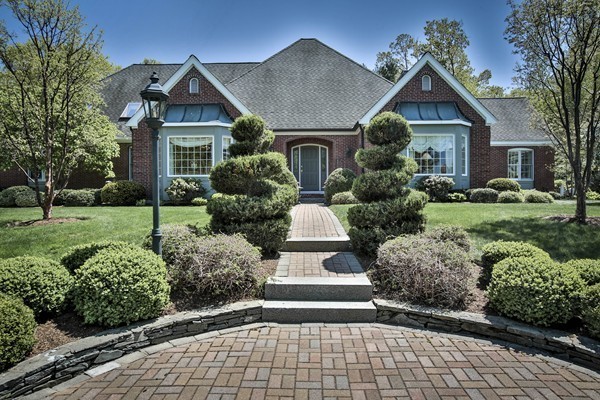 113 Kettle Hole Road Bolton, MA 01740 - Photo 1 of 30 a front view of a house with a yard