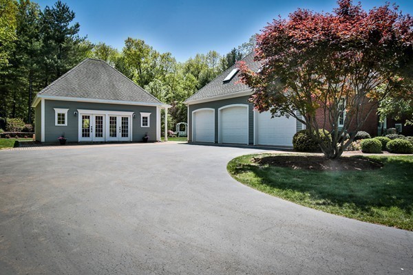 113 Kettle Hole Road Bolton, MA 01740 - Photo 4 of 30 a front view of a house with a garden