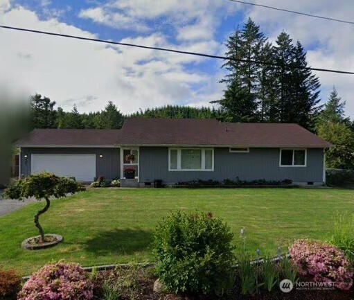 4047 Offut Lake Road Southeast Tenino, WA 98589 - Photo 1 of 1 a front view of a house with garden
