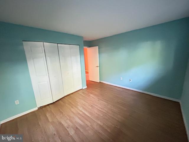 3 Windblown Court, Unit 102 Baltimore, MD 21209 - Photo 18 of 18 an empty room with closet area