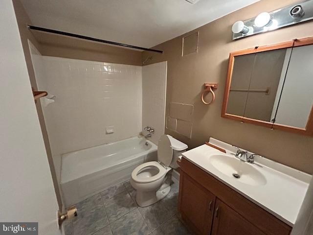 3 Windblown Court, Unit 102 Baltimore, MD 21209 - Photo 6 of 18 a bathroom with a sink a toilet and shower