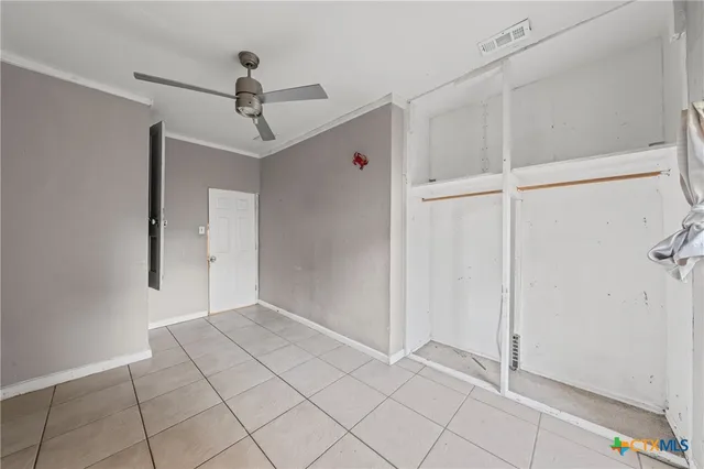 a bathroom with a sink toilet vanity and shower