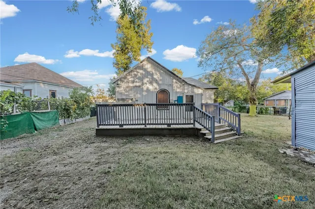 a picture of a bench in front of a door