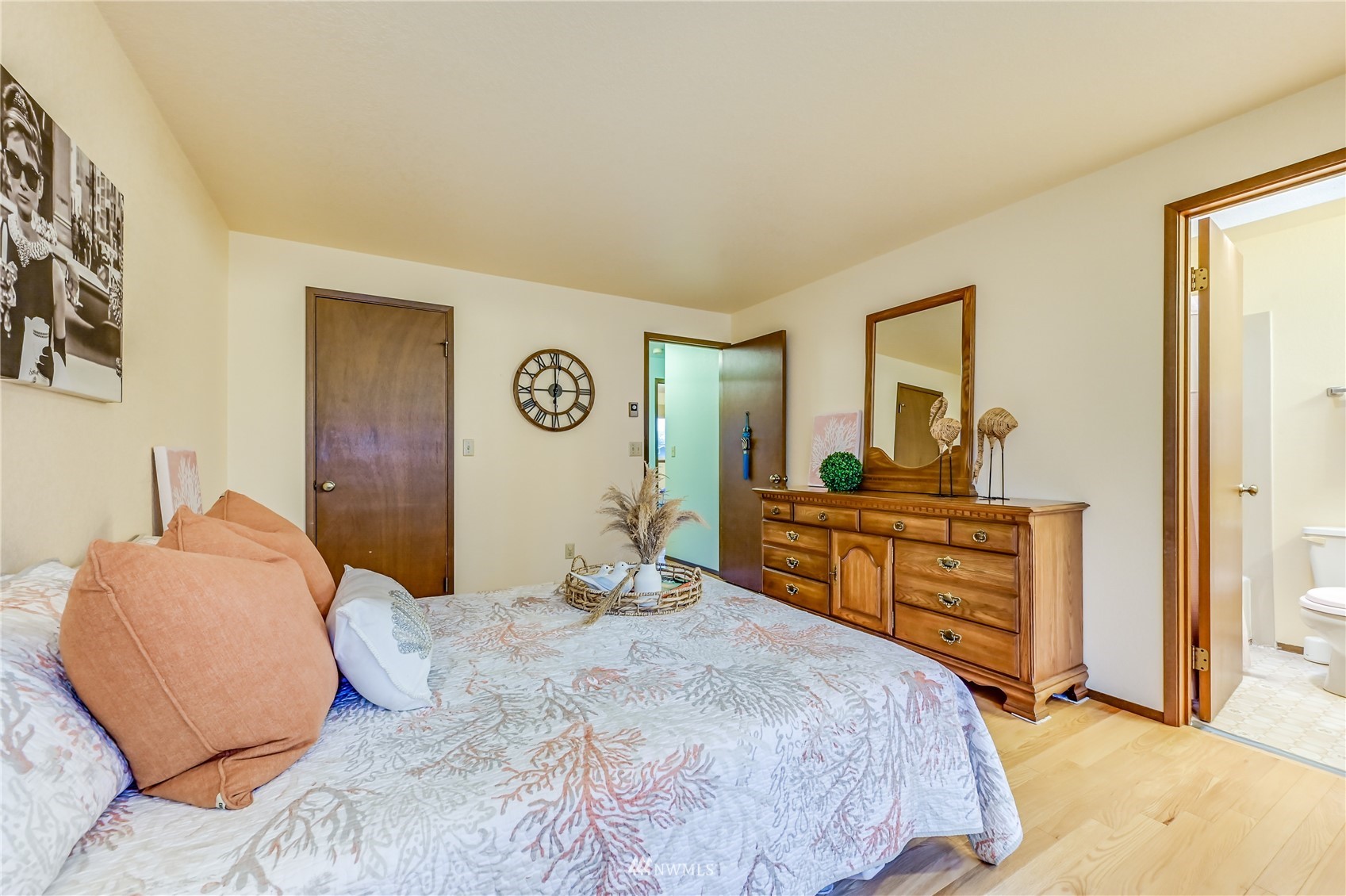 1217 225th Place Southwest Bothell, WA 98021 - Photo 13 of 21 a bedroom with a bed and a dresser