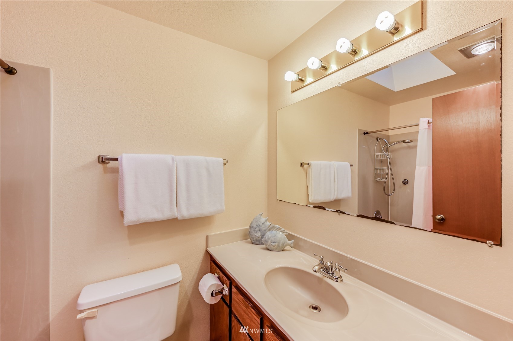 1217 225th Place Southwest Bothell, WA 98021 - Photo 17 of 21 a bathroom with a sink vanity granite and toilet