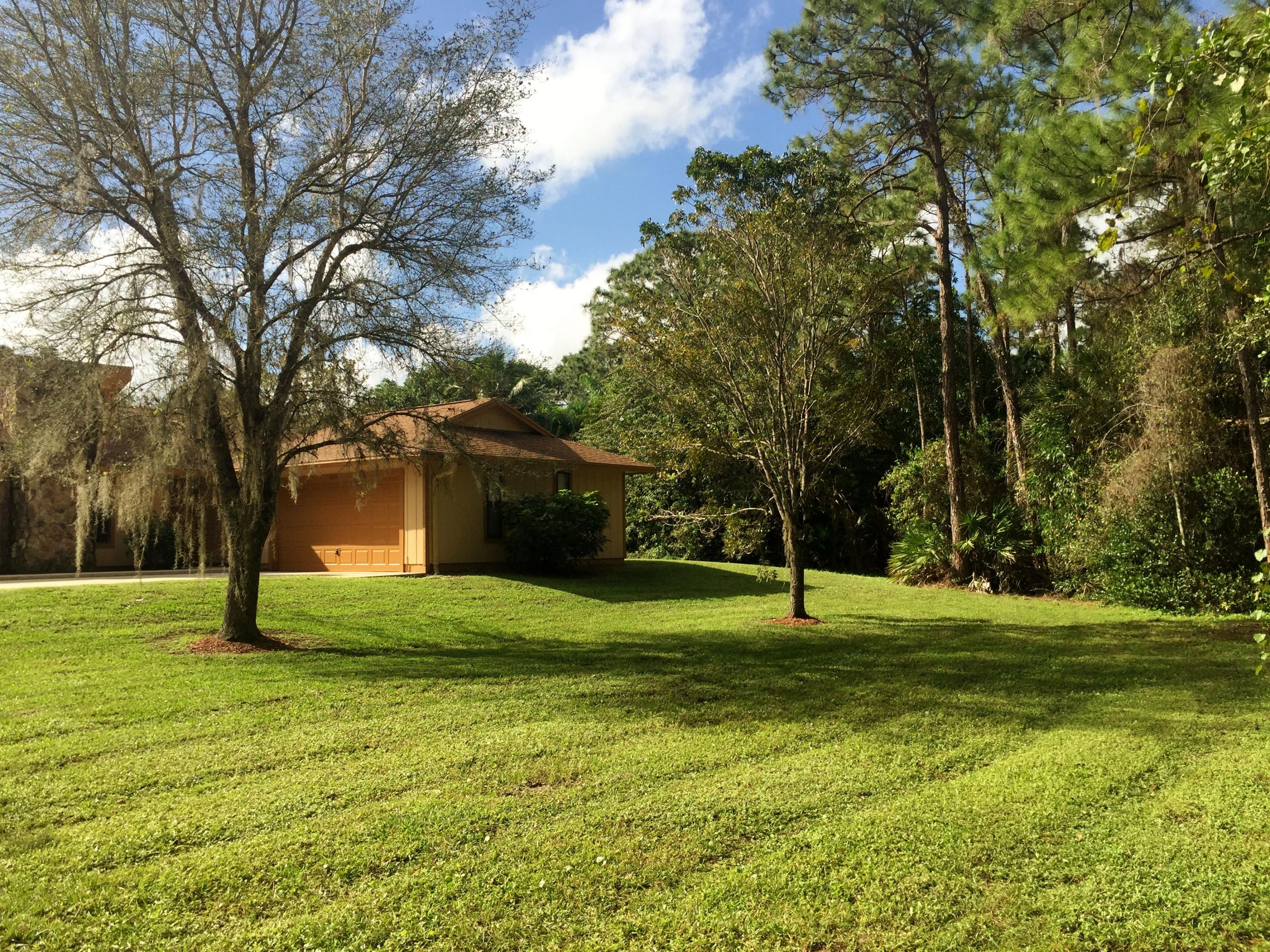 11150 154th Road North Jupiter, FL 33478 - Photo 41 of 52 Side Yard 2
