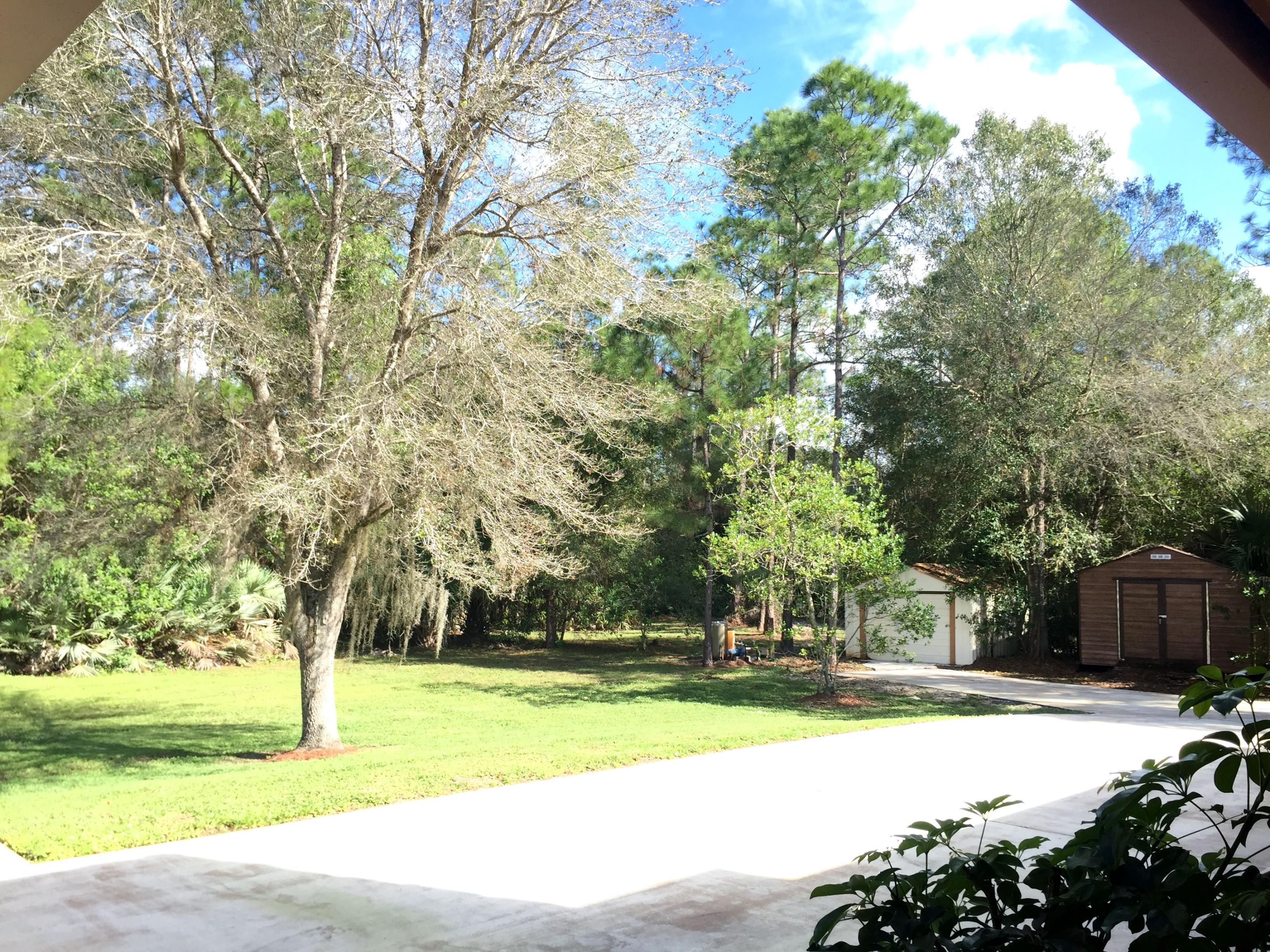 11150 154th Road North Jupiter, FL 33478 - Photo 48 of 52 Front Yard 2