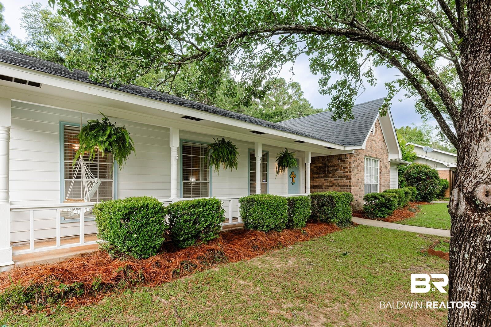 2920 Quail Creek Run Mobile, AL 36695 - Photo 1 of 33 Single story home with a porch, roof with shingles, and a front yard